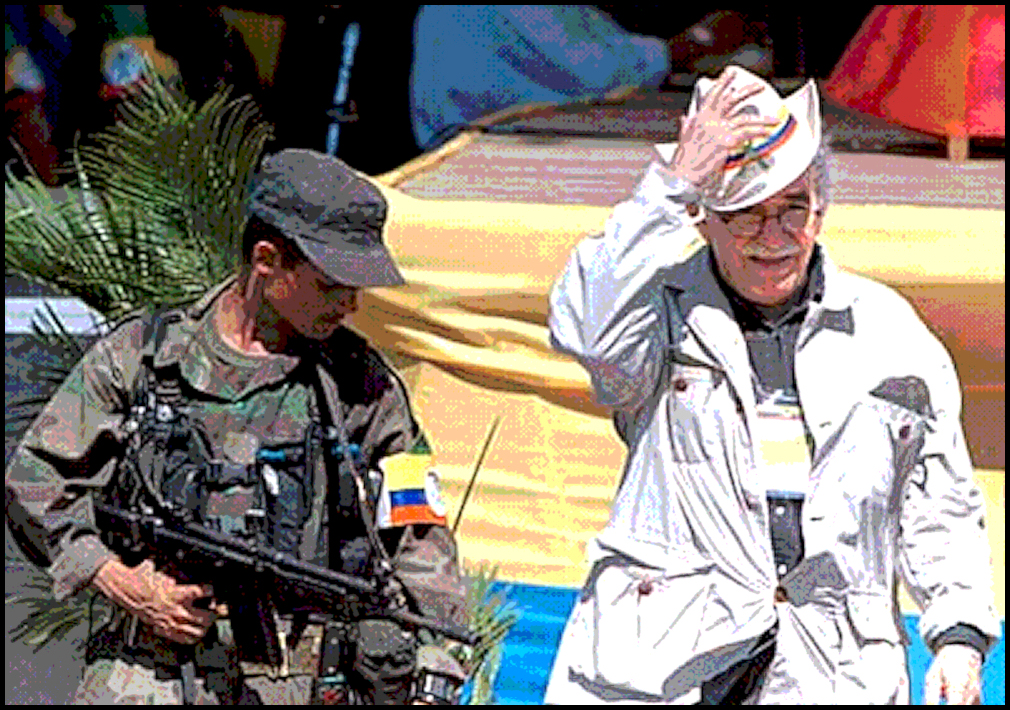 Gabriel García
              Márquez and a leftist FARC guerrilla at peace talks
              in Colombia, January 8, 1999