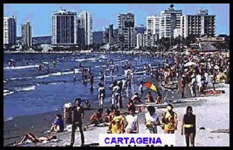 populated beach with high-rise downtown Cartagena a
              few blocks behind