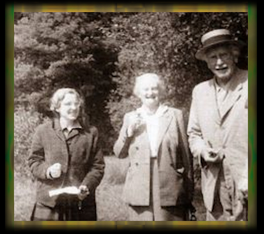 Marie-Louise
                von Franz and Barbara Hannah with their hero Carl Jung,
                black and white photo, probably late 50s