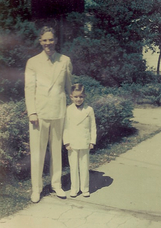 mj age 6 with his Daddy, Rev Lorenzo, both in white
              suits and shoes