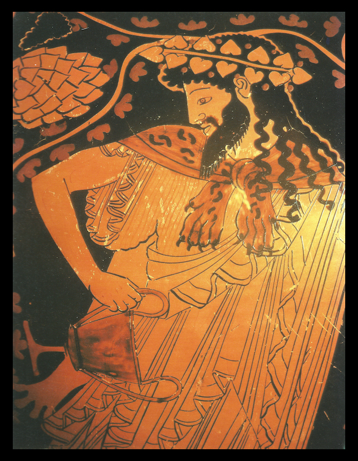 ancient Greek
                vase in orange and black depicts the god Dionysus
                dancing with wine cup